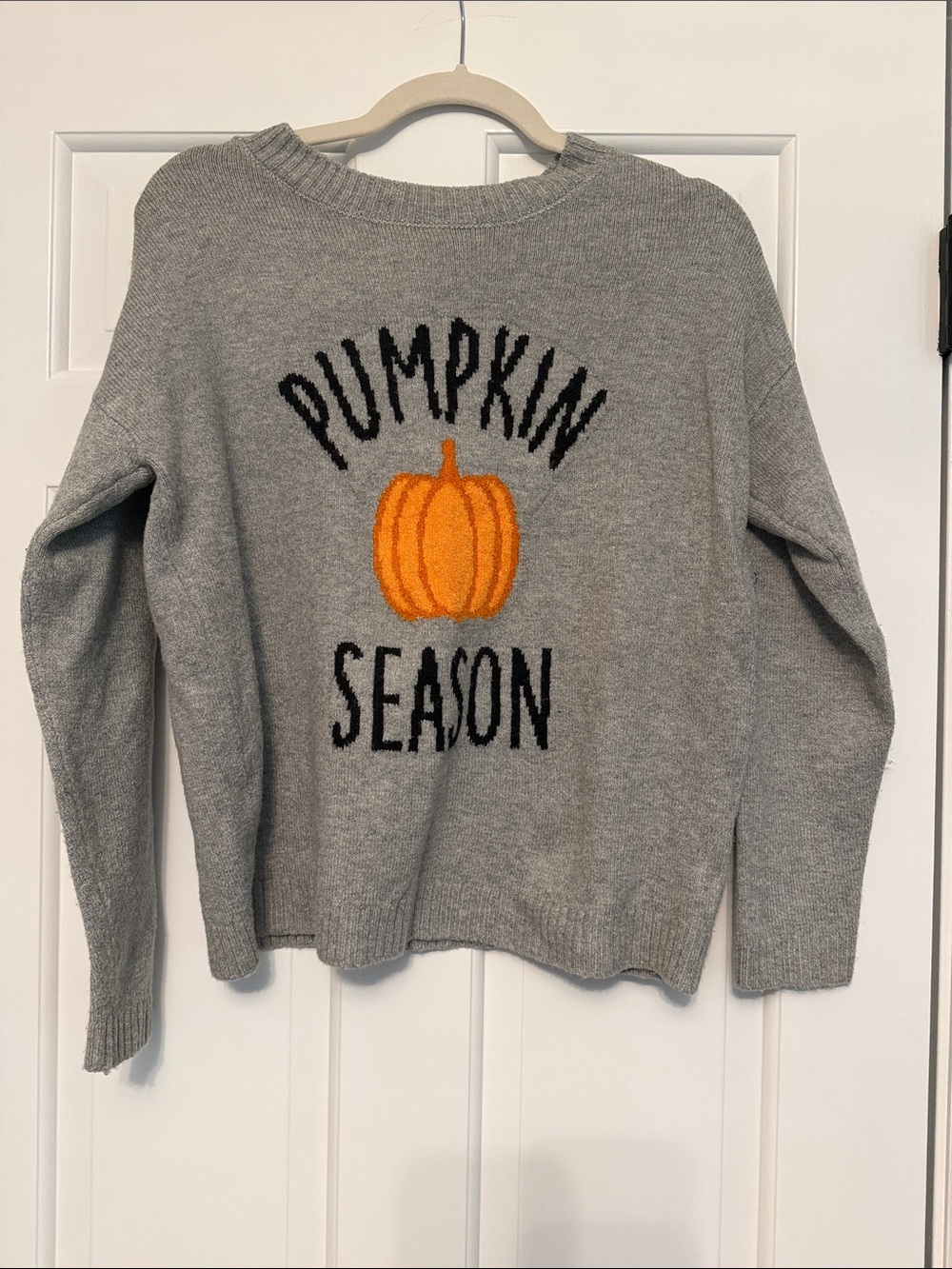 Cozy Gray Crewneck Sweater with Orange Pumpkin Motif